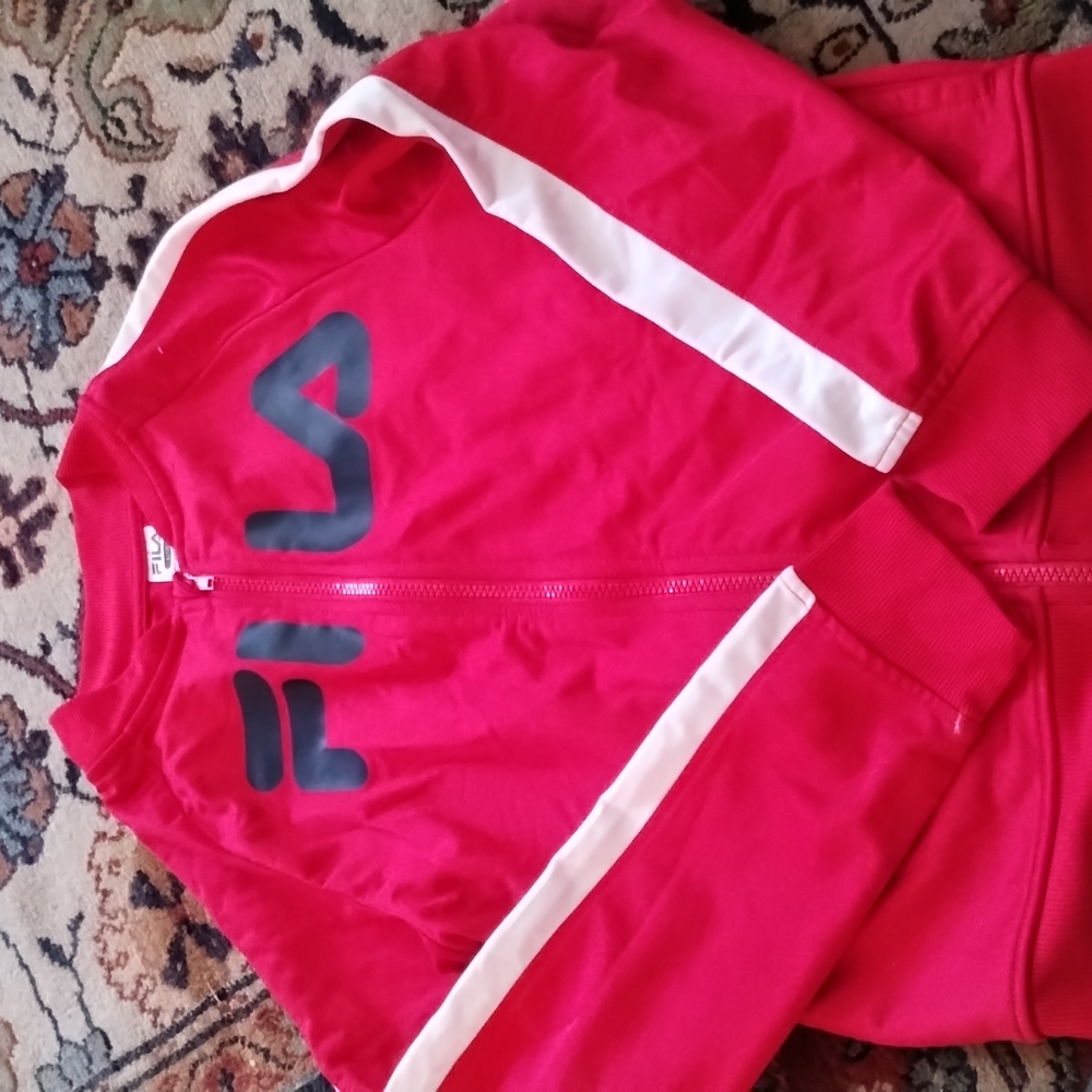 boys size L ( youth ) fila zip up nylon jacket.